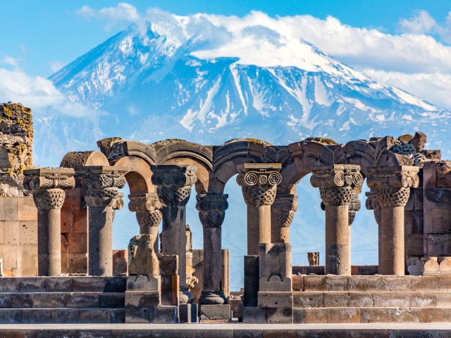 Ruins of the Zvartnos temple in Yerevan, Armenia, with Mount Ararat in the background