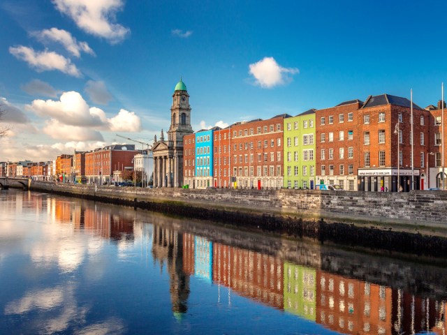 Colorful buildings along Liffey River in Dublin, Ireland