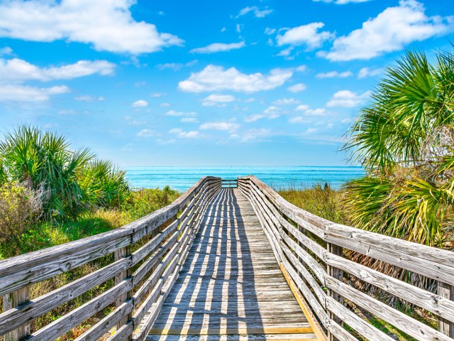 Wooden footbridge leading to Florida coast