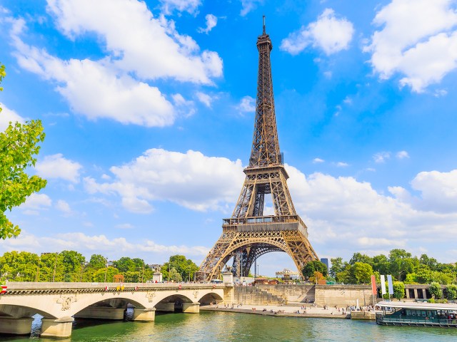 View of Eiffel Tower across Seine River in Paris, France