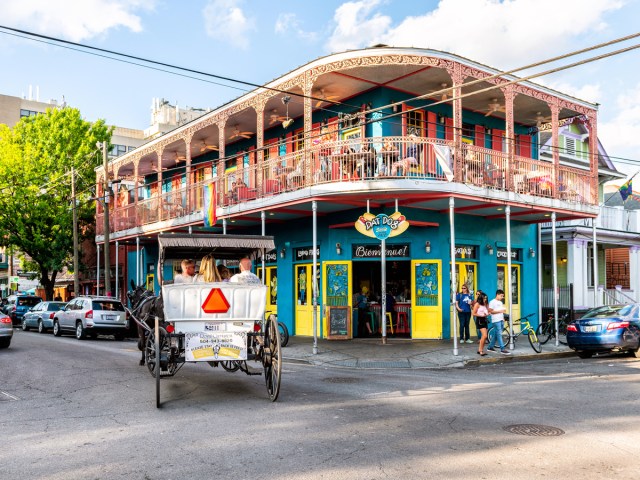 Buildings and tourists on Frenchman Street in New Orleans, Louisiana