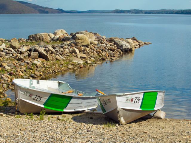 Rowboats on rocky beach on the Quabbin Reservoir in Massachusetts