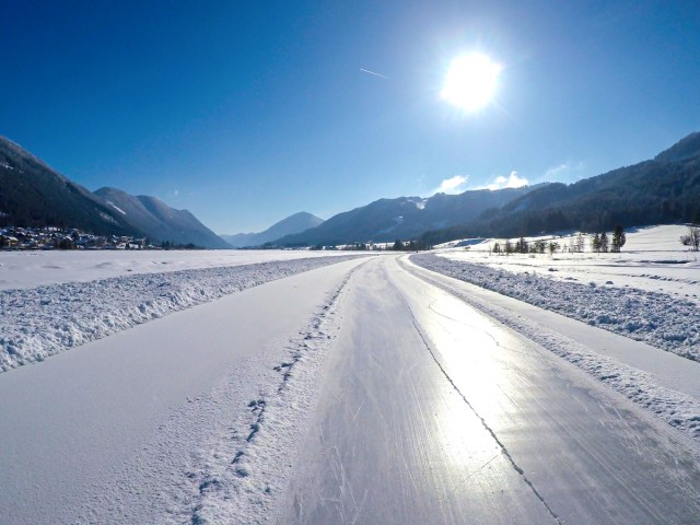 Ice rink on frozen Lake Weissensee in Austria