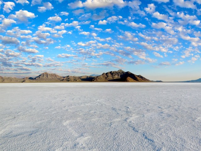 Bonneville Slat Flats under partly cloudy sky with mountains in the distance