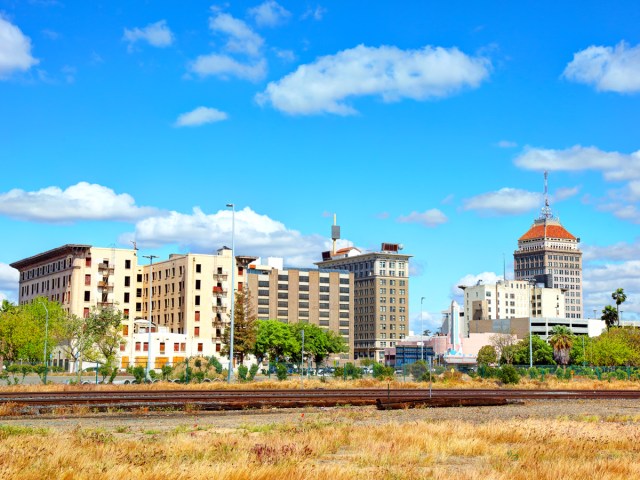 Train tracks and high-rise buildings in Fresno, California
