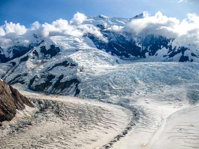 Aerial view of glacier field and snow-capped peaks at Alaska's Wrangell-St. Elias National Park