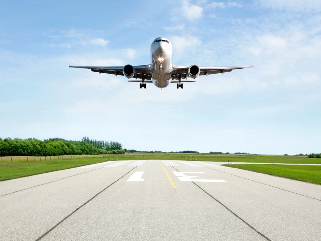 Jet landing on airport runway
