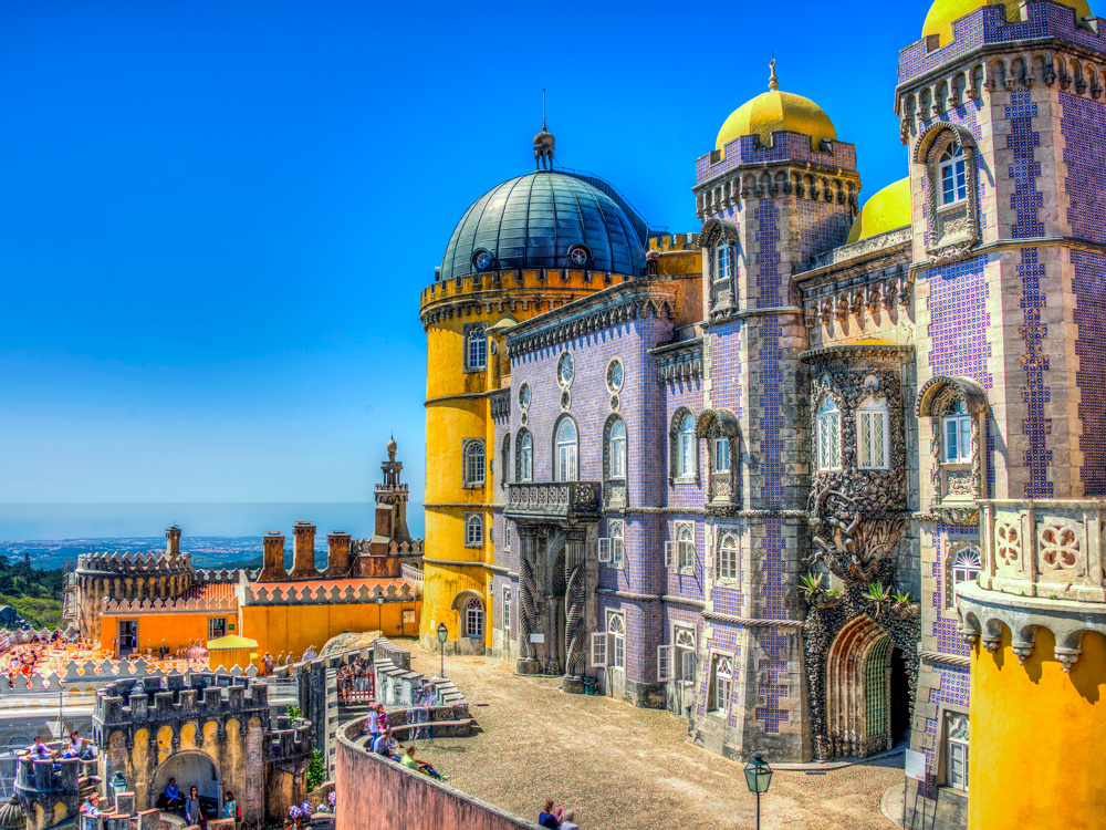 Colorful and ornate palaces overlooking countryside in Sintra, Portugal