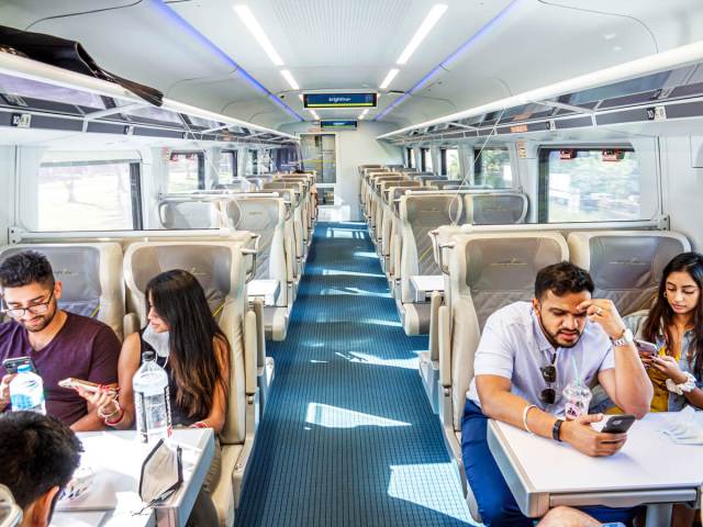 Passengers aboard train car