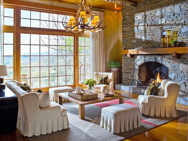 Seating area and fireplace at Twin Farms Resort in Vermont