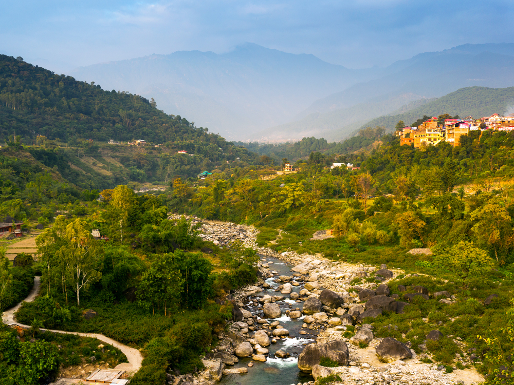 Small river flowing through valley in Chandigarh, India