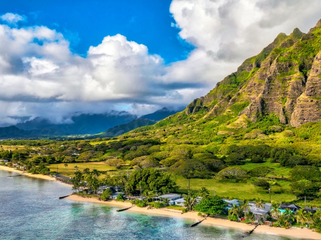 Lush mountains along the coast of Honolulu, Hawaii, seen from above