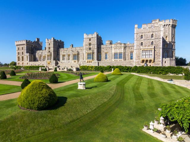 Exterior and manicured grounds of Windsor Castle in England
