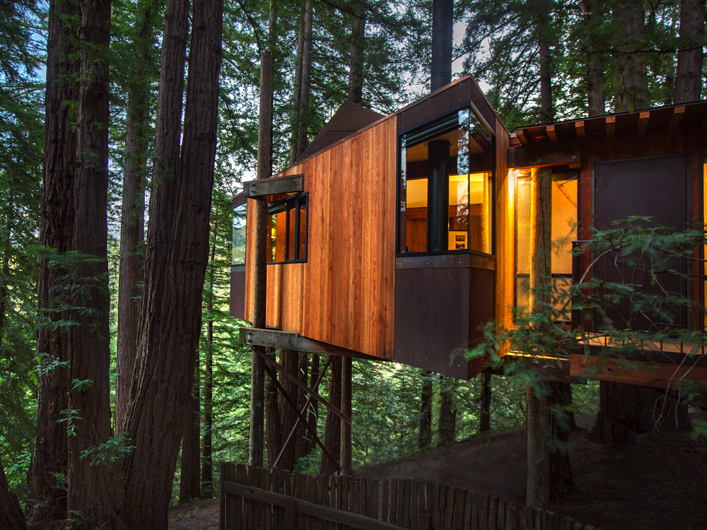 Accommodation on stilts surrounded by forest at Post Ranch Inn in California