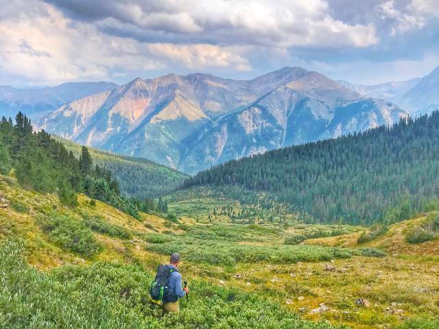 Person hiking in Rocky Mountains of Colorado