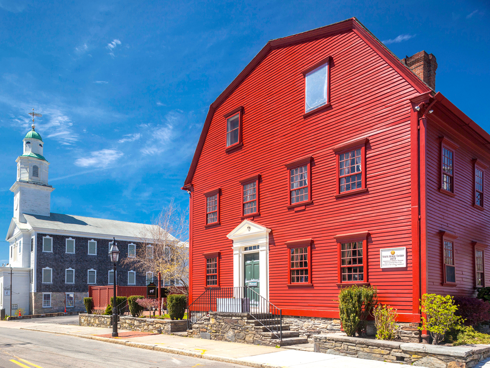 Bright red colonial-style exterior of White Horse Tavern in Newport, Rhode Island