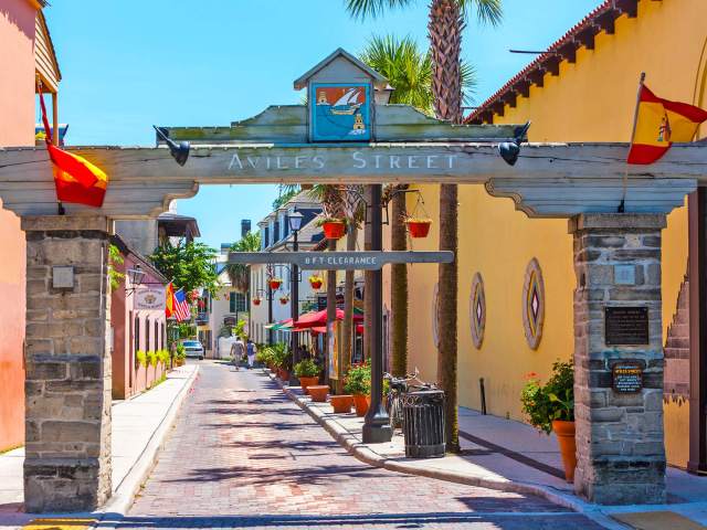 Archway marking entrance to historic Aviles Street in St. Augustine, Florida