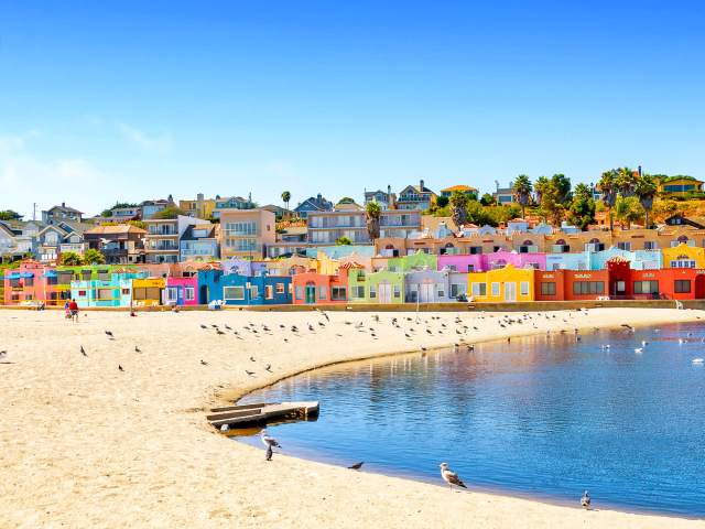 Sandy beach and colorful homes of Capitola, California