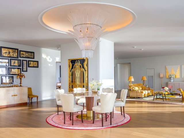 Dining area with chandelier in Penthouse Suite at Faena Hotel, Miami Beach