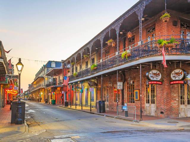 Two-story venues along Bourbon Street in New Orleans, Louisiana