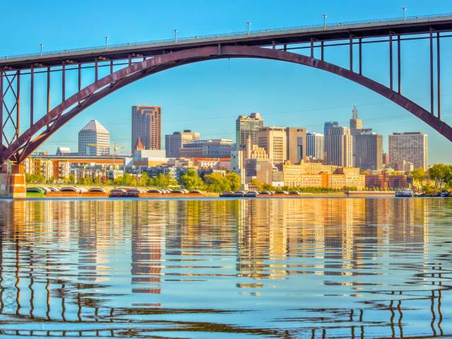 Bridge over Mississippi River with St. Paul, Minnesota, skyline seen underneath