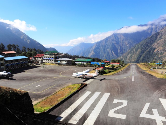 Tenzing-Hillary Airport in Nepal surrounded by Himalayan mountains