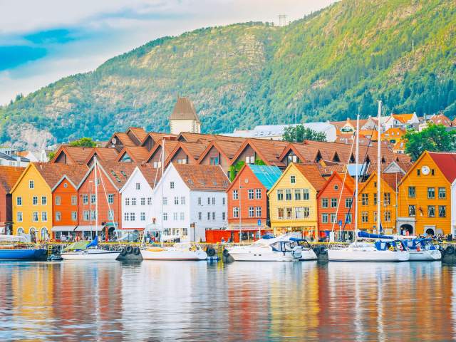 Waterfront buildings in Bergen, Norway, with mountains behind