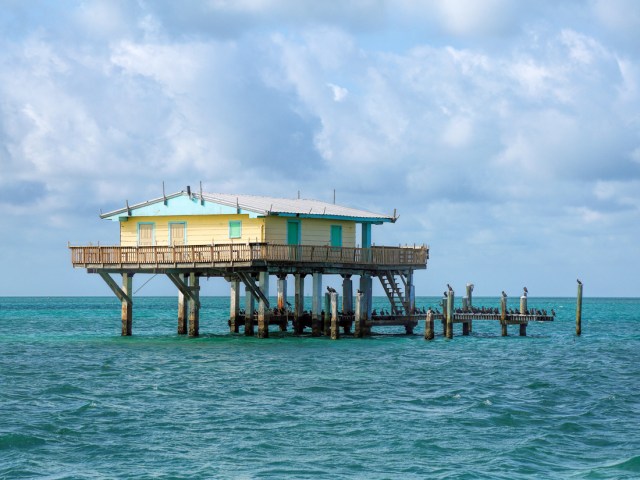 Home sitting on stilts over Biscayne Bay in Miami, Florida