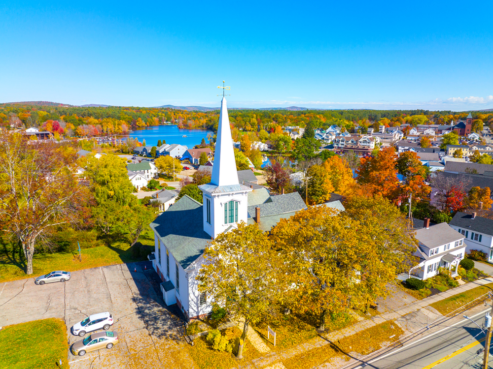 Aerial view of church and other buildings in lakeside town of Wolfeboro, New Hampshire
