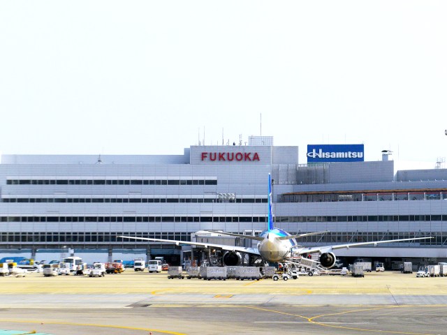 Aircraft parked at Fukuoka Airport terminal