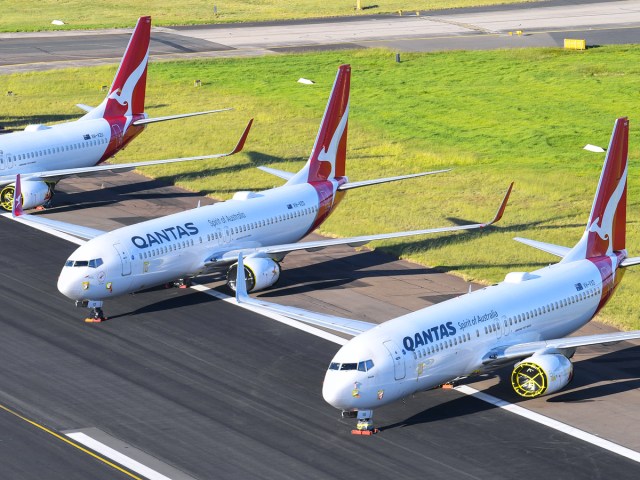 Aerial view of Qantas Boeing 737s parked on runway