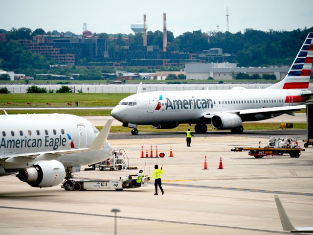 Pair of American Airlines jets on airport tarmac