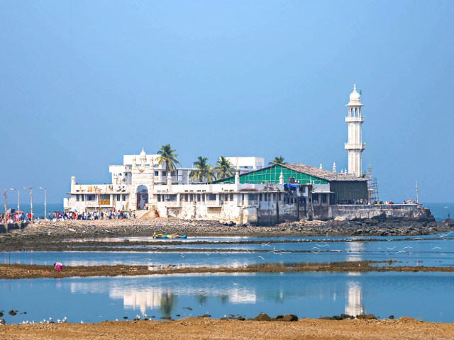 View of worshippers in distance at Haji Ali Dargah in India

