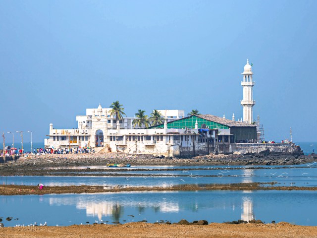 View of worshippers in distance at Haji Ali Dargah in India 