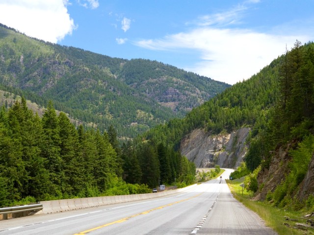 Empty stretch of U.S. Route 12 through mountainous landscape