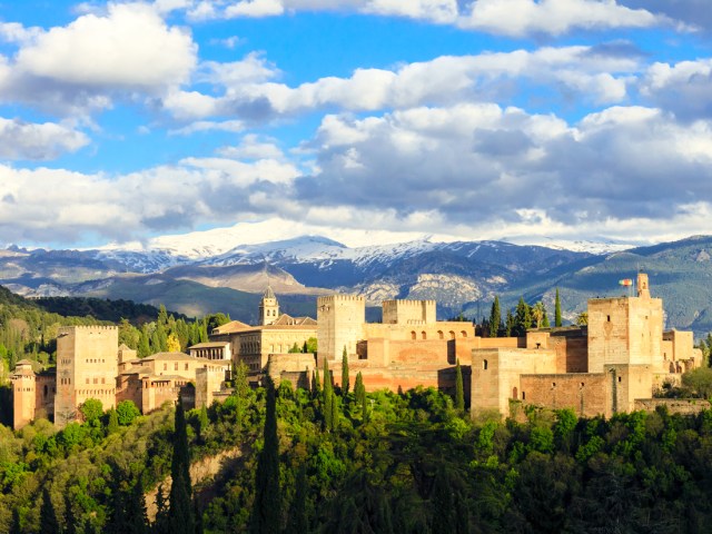 View of hilltop Alhambra palace in Grenada, Spain, in the distance
