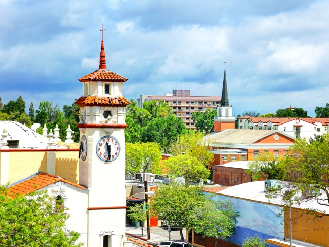 Clock tower and surrounding buildings seen from above in Visalia, California