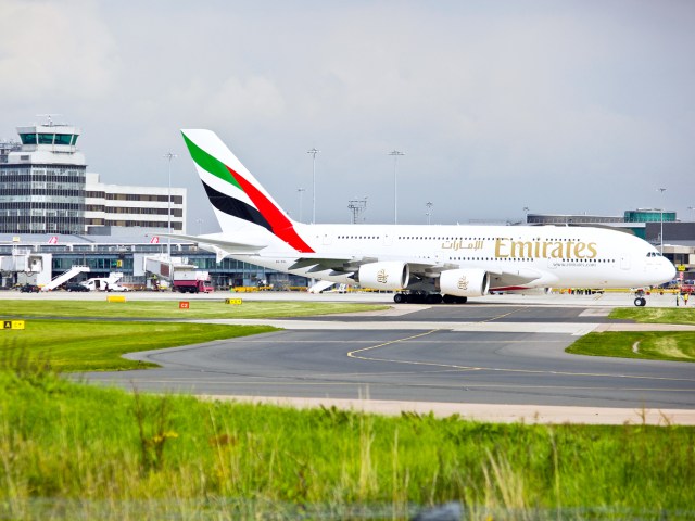 Emirates Airbus A380 jumbo-jet taxiing on runway