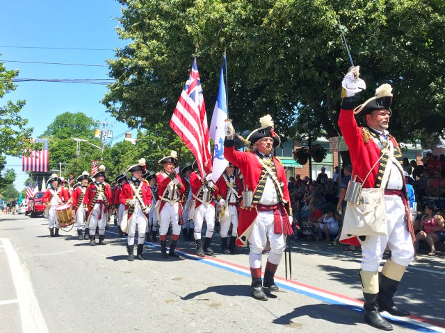 Participants dressed in Revolutionary War garb in the Bristol Fourth of July Parade in Bristol, Rhode Island