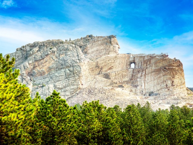 Image of the Crazy Horse Memorial carved into mountain in South Dakota