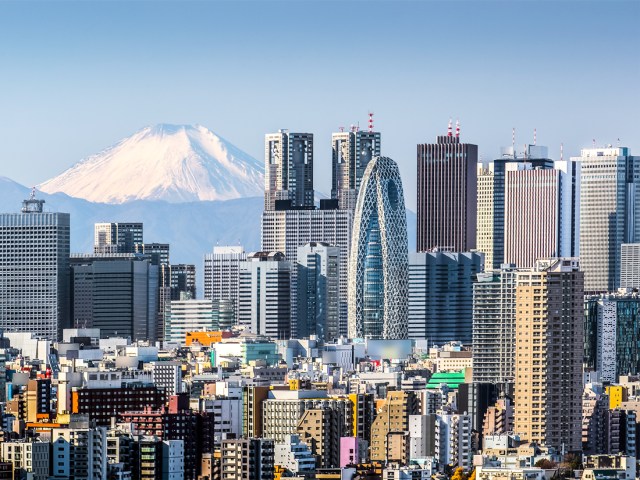 Skyscrapers in Tokyo, Japan, with snow-capped Mount Fuji in background