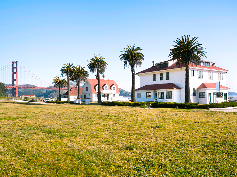 Crissy Field in San Francisco with buildings and Golden Gate Bridge in background