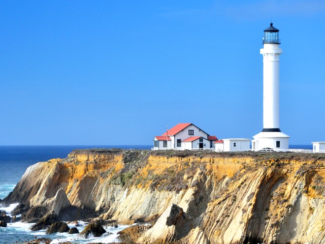 View of Point Arena Lighthouse across cliffs of Mendocino County