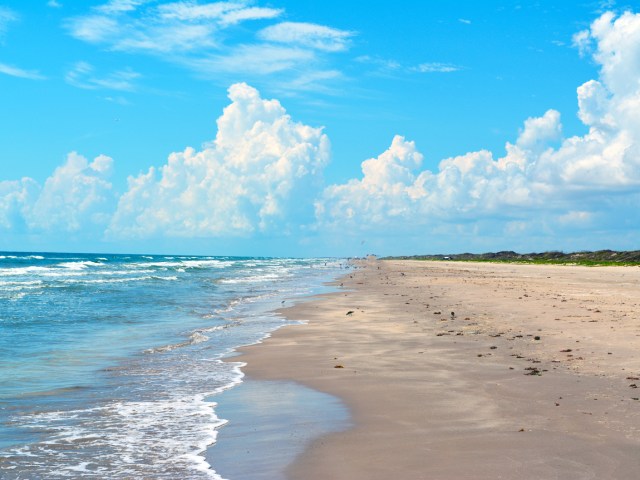 Empty, sandy beach along the Gulf of Mexico on Padre Island in Texas