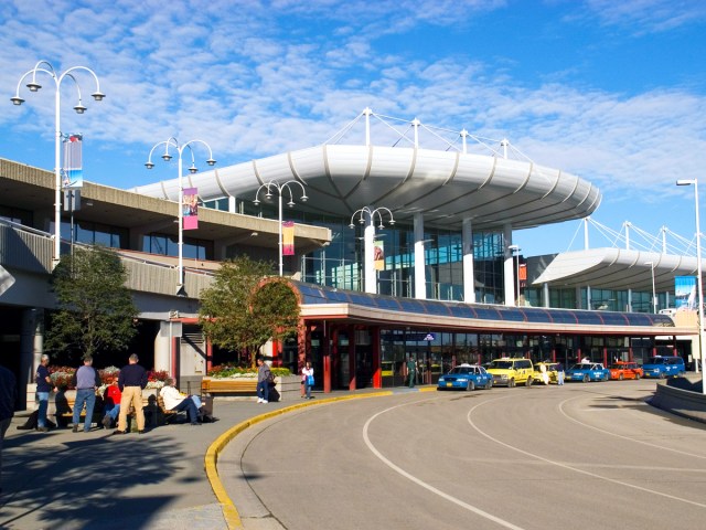 Roadway and terminal building exterior at Ted Stevens Anchorage International Airport in Alaska