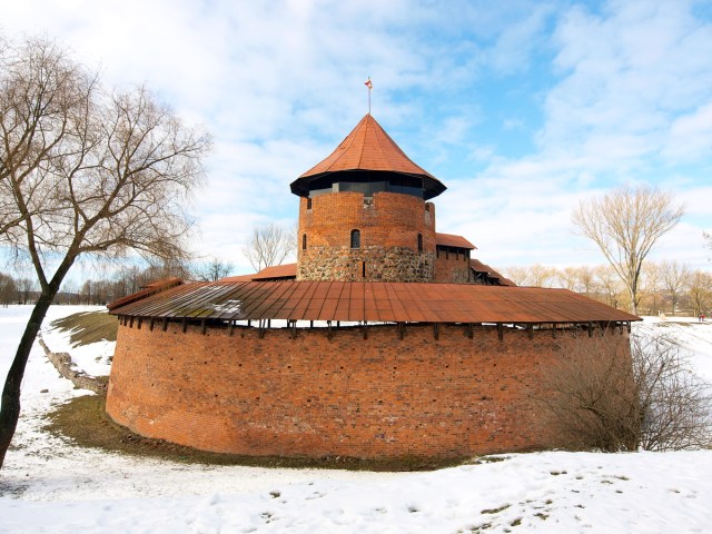 Kaunas Castle in Lithuania surrounded by snow
