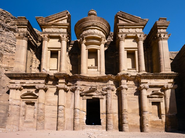 Rock-carved facade of the Treasury building in Petra, Jordan