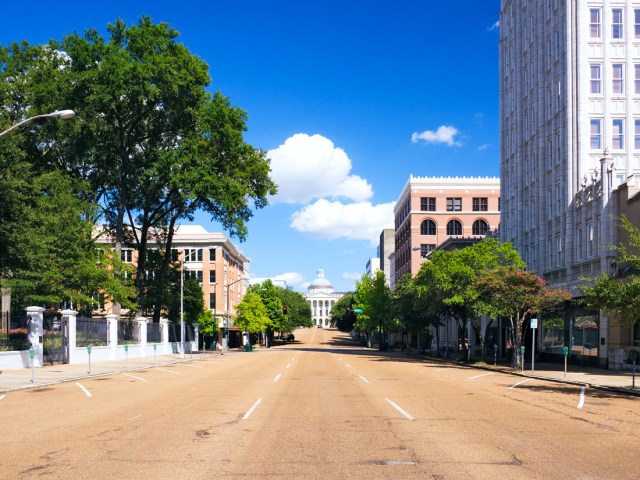 Empty street leading to state capitol building in Jackson, Mississippi 