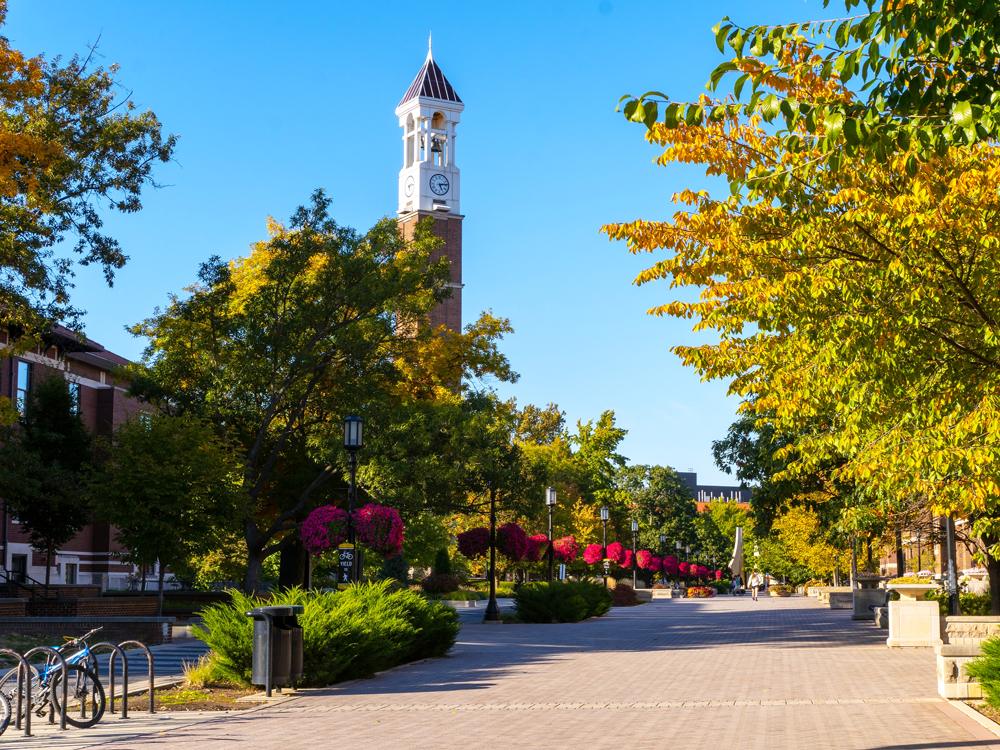 Purdue Bell Tower partially obscured by trees on campus of Purdue University