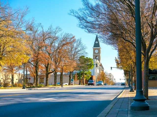 Street lined with fall foliage in Fayetteville, Arkansas